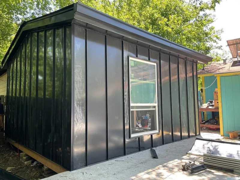 Black standing seam metal wall panels for Metal Roof Installation in Naples