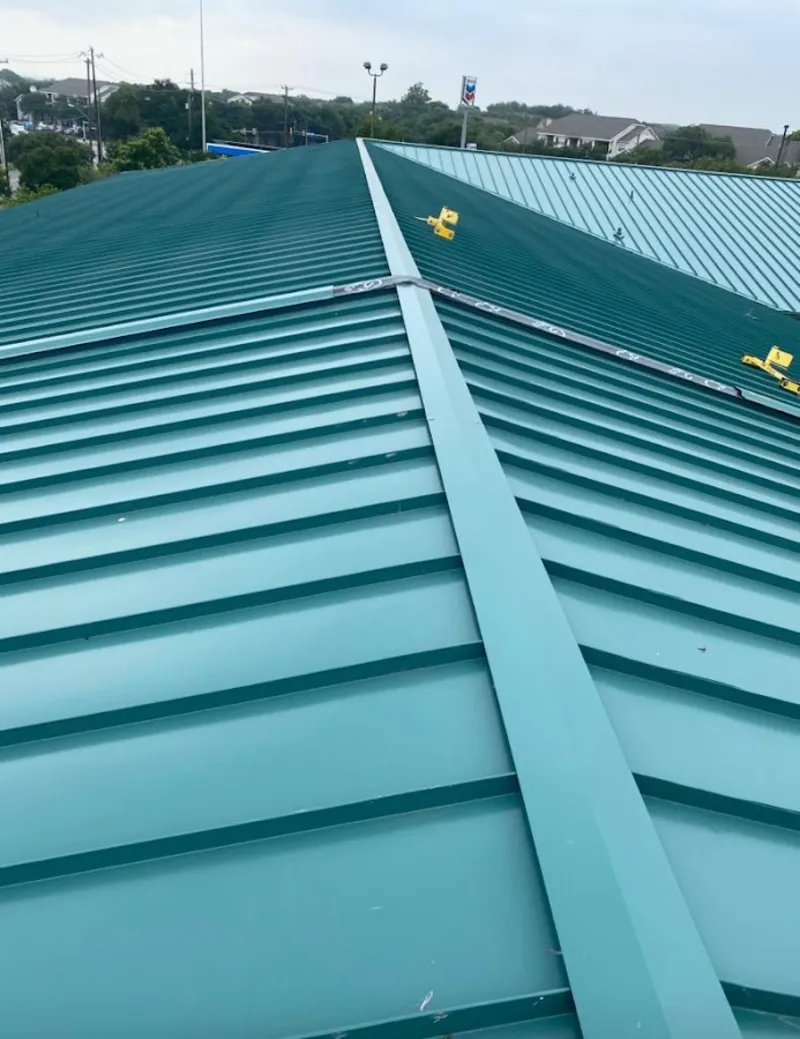 Green commercial metal roof ridge and valley for Metal Roof Repair in Naples